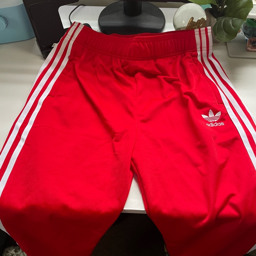 Red adidas sweatpants